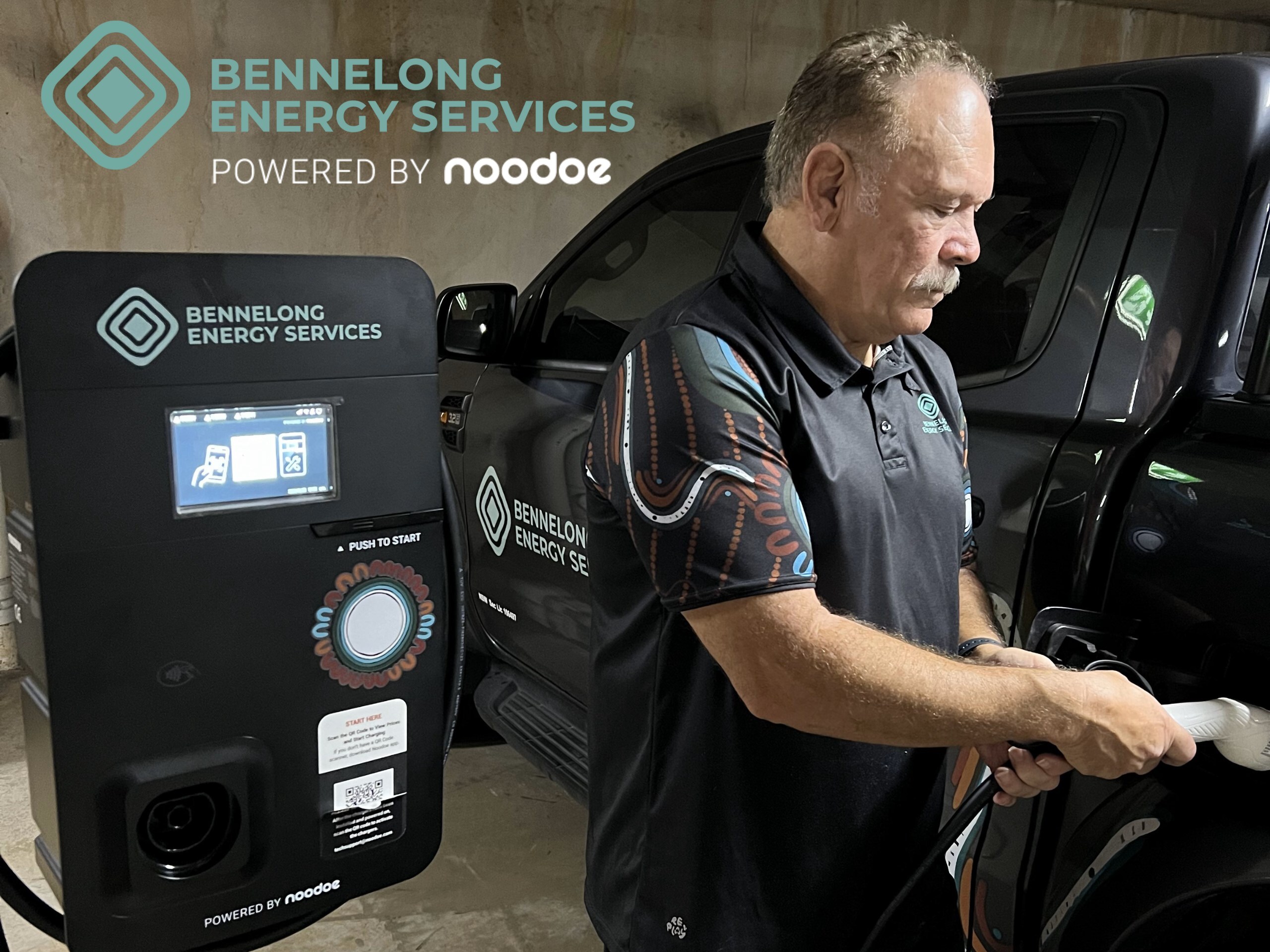 Owner and director of Bennelong Energy Services, Cliff Lyons, using A new Bennelong Energy Services EV charger Powered by Noodoe. Photo: Bennelong Energy Services